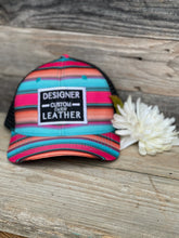 Load image into Gallery viewer, Serape with Black and White Patch Ponytail Cap
